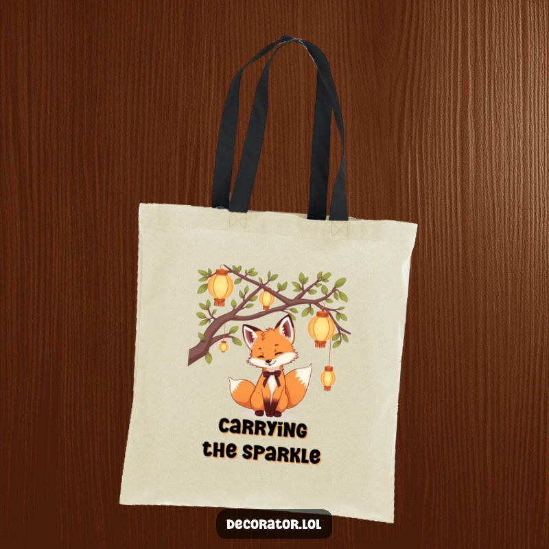 Funny Tote Bag featuring a playful fox cub decorating tree branches with delicate lanterns, a whimsical and humorous accessory.